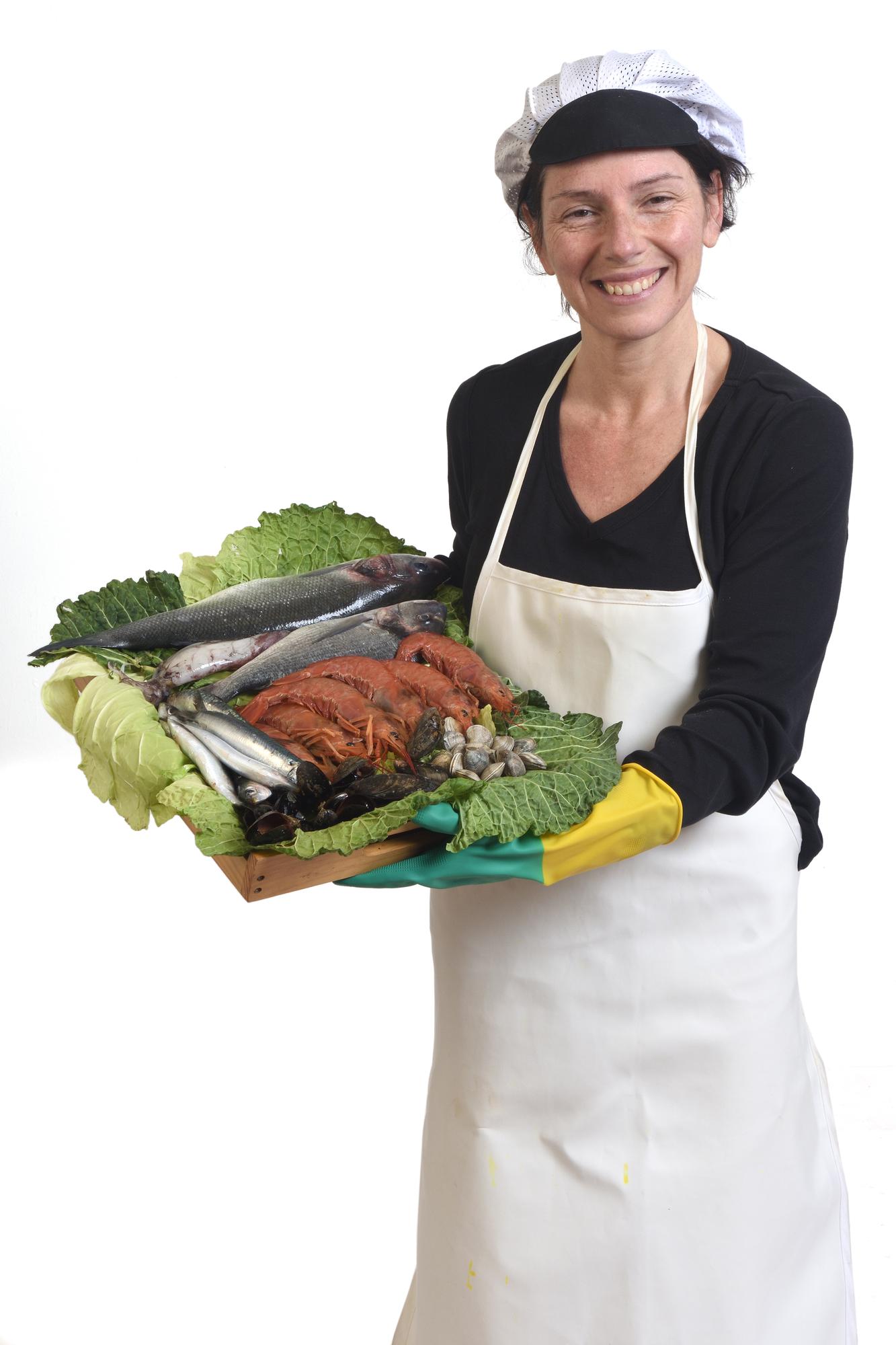 Chef offering local produce on tray